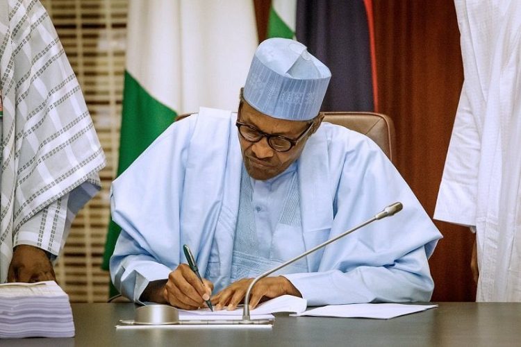 0_1586819961426_Buhari-signing-covid-19-extension.jpg