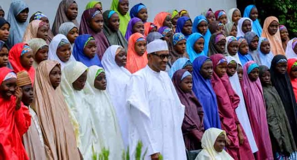 0_1522007226646_Dapchi girls with buhari.jpg