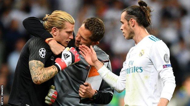 0_1527498901109_Loris Karius consoled.jpg